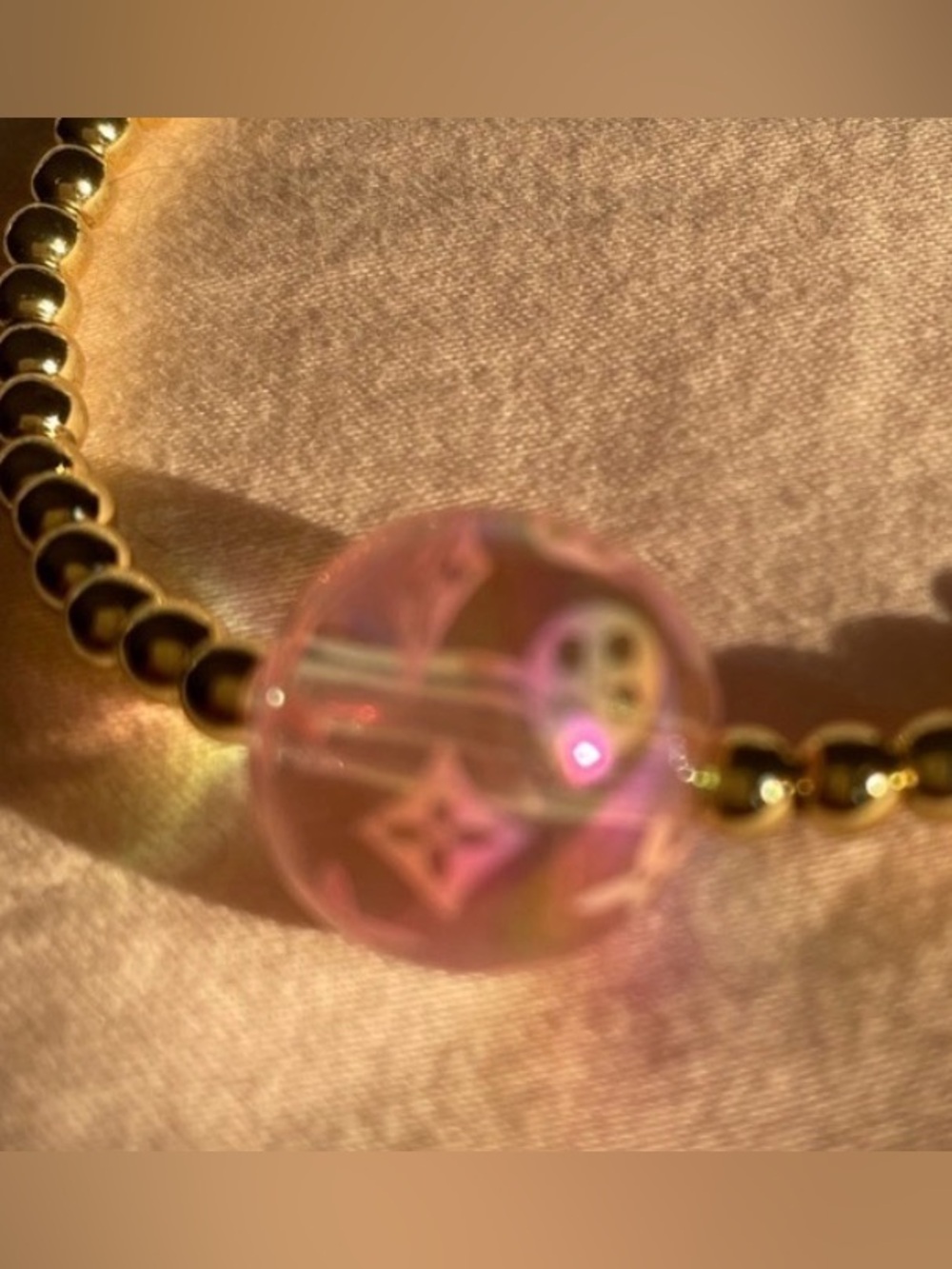 Gold Beaded Bracelet with Pink Accent Bead